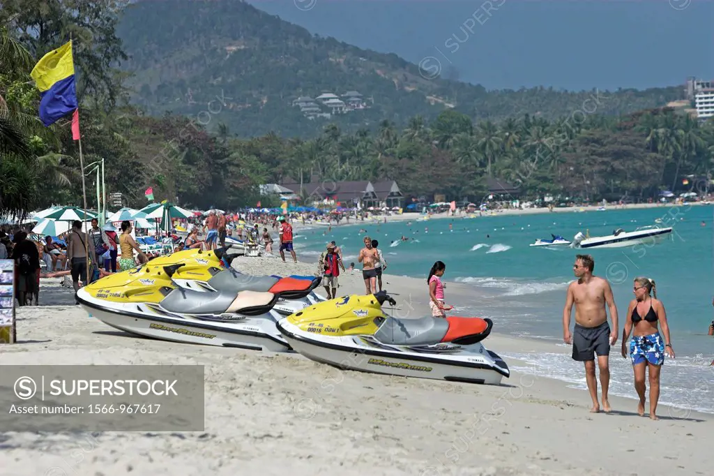 WaveRunner jet skis on busy Chaweng Beach high season Ko Samui island Thailand
