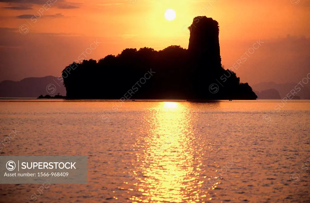 Sunset over a rocky island, Phang-Nga Bay, southwest Thailand