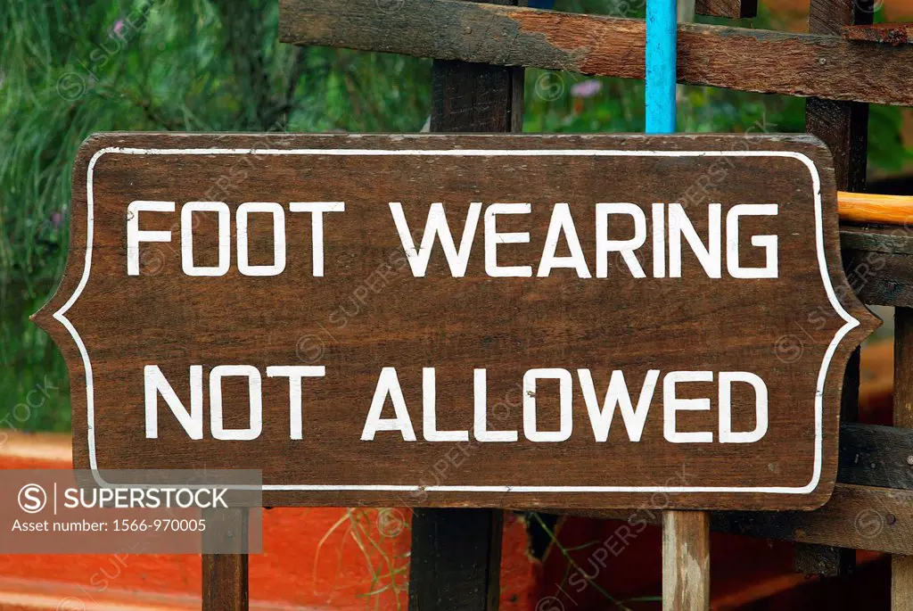 Foot Wearing Not Allowed amusing wooden sign in Burma