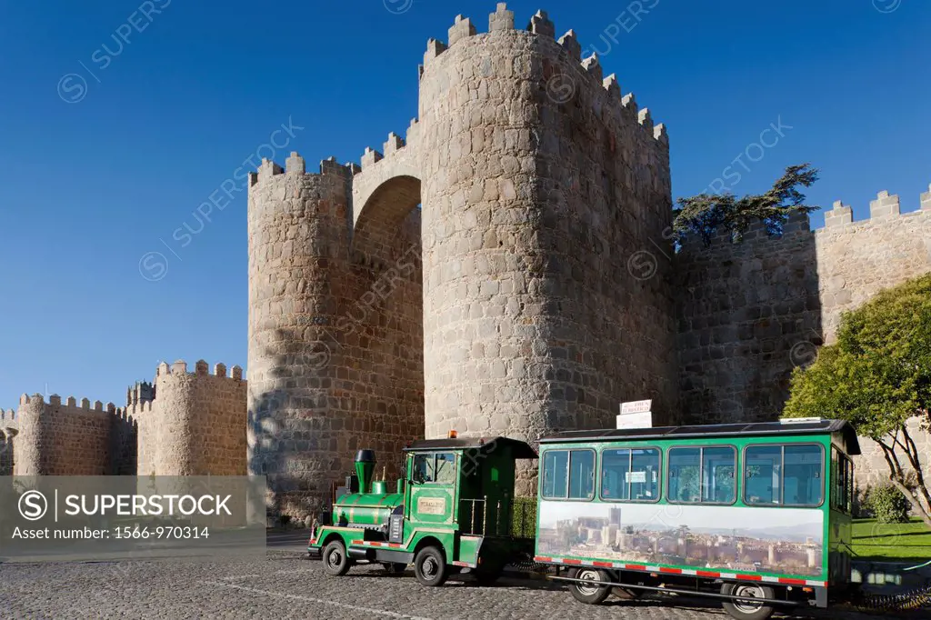 Spain, Castilla y Leon Region, Avila Province, Avila, Las Murallas, town walls, and El Murallito tourist trian by the Puerta de los Leales gate