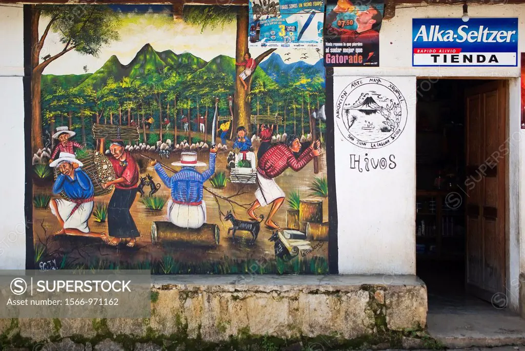 Mural painting on the outside wall of a house and store in San Juan La Laguna, Sololá, Guatemala
