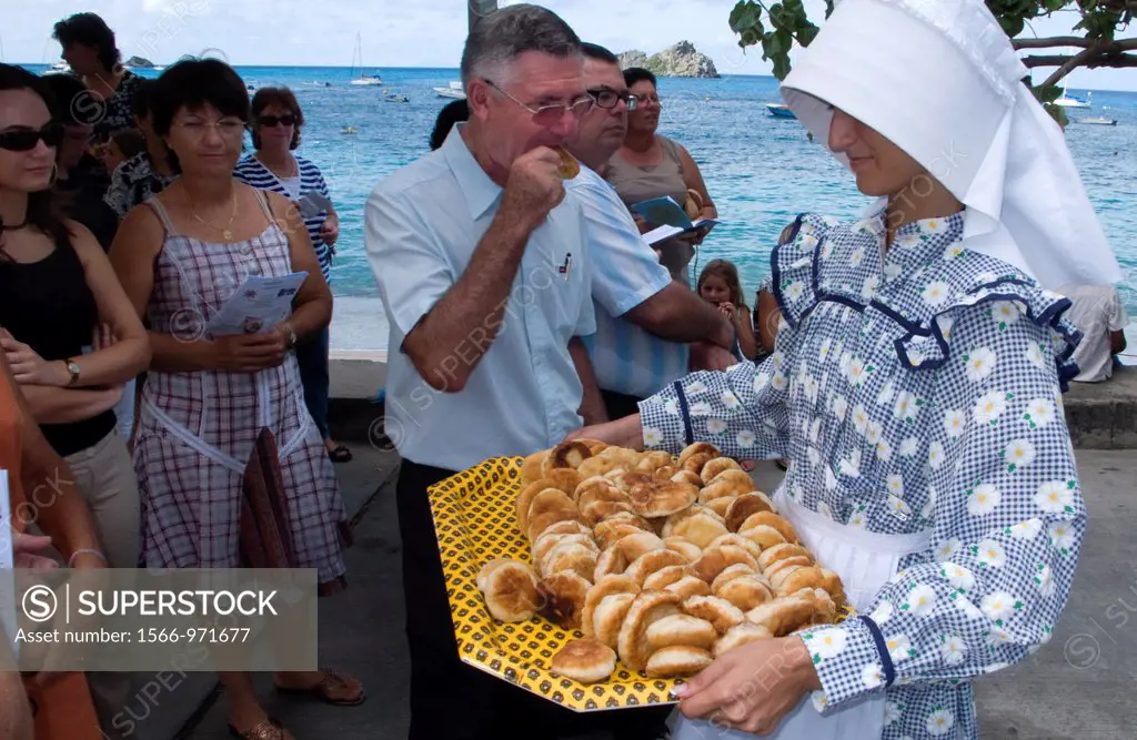 Traditional costume and galettes or griddle cakes are part of the Saint Louis Festival Corossol St Barts