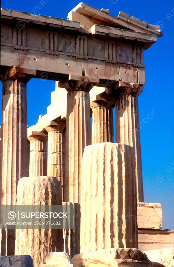 The Parthenon temple dedicated to the virgin Athena stands on the Acropolis hill overlooking Athens Greece