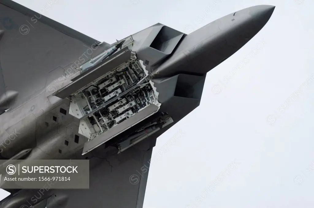 American Stealth jet fighter F-22 Raptor missile bombs cache viewed in flight, Elmendorf Air Force base, Anchorage, Alaska, Usa