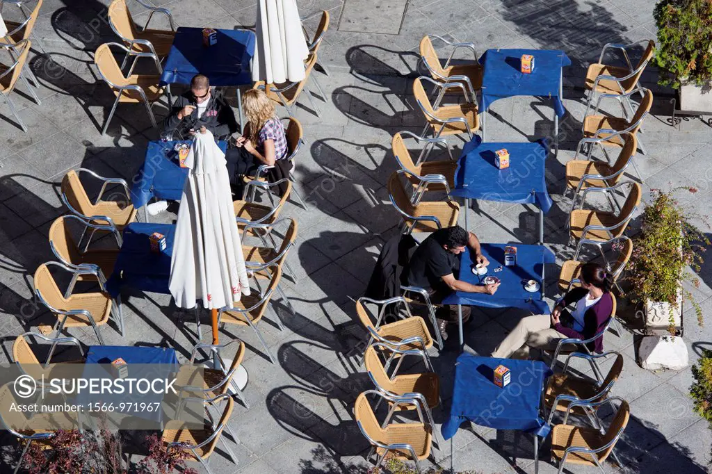 Spain, Castilla y Leon Region, Avila Province, Avila, elevated view of outdoor cafes on Calle de San Segundo street