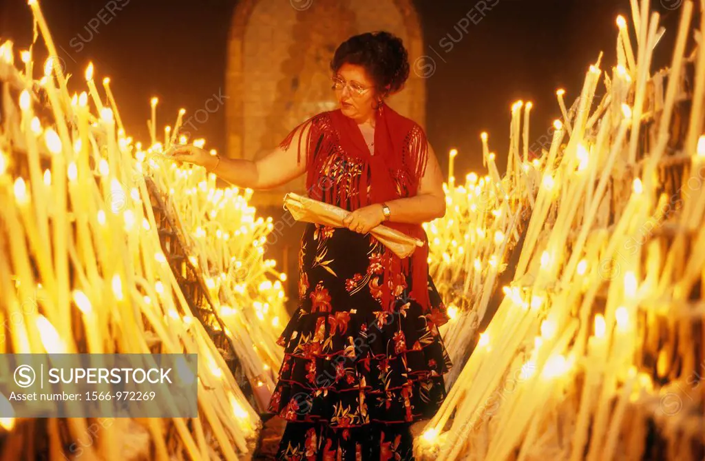 El Rocío Romería pilgrimage,Votive candles in the side chapel of the Ermita del Rocío, El Rocío, Almonte, Huelva province, Andalucia, Spain