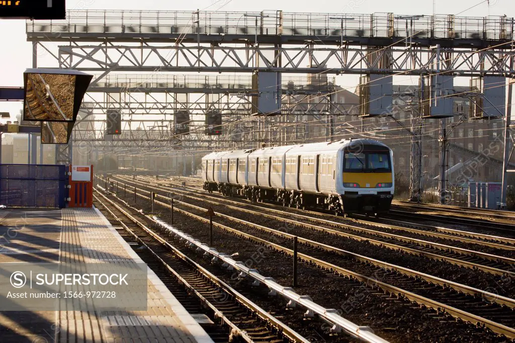 Train passing along multiple tracks in Stratford London