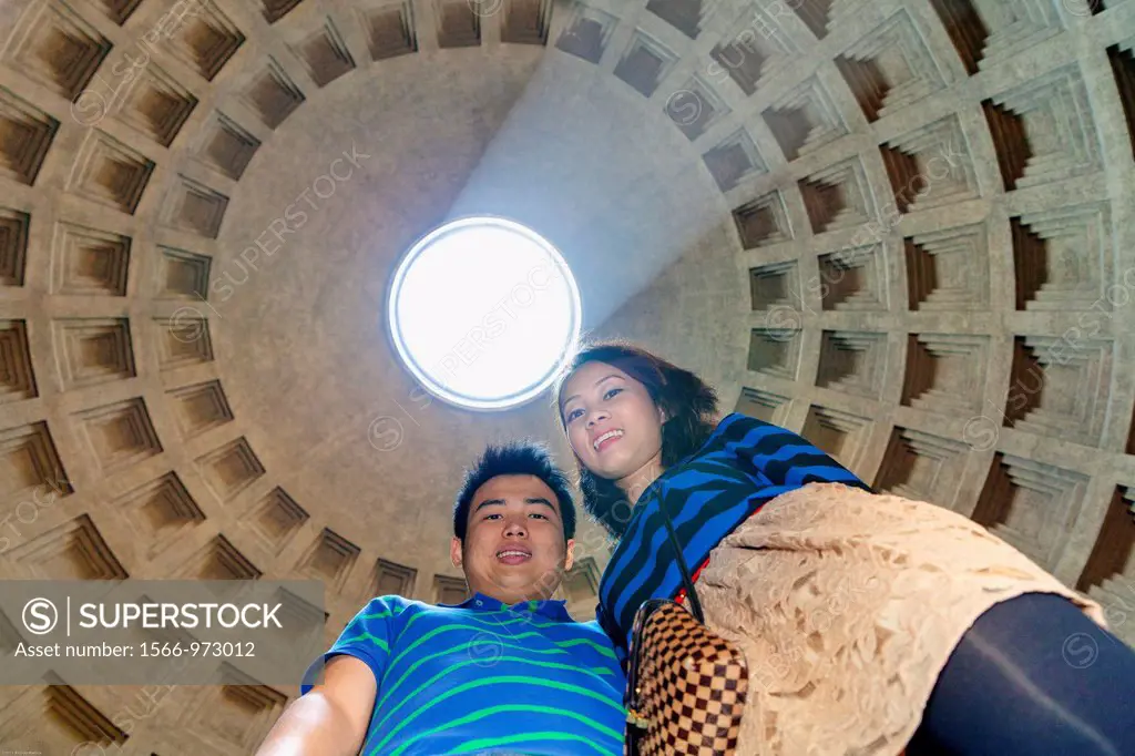Couple together in the Roman Pantheon Rome Italy