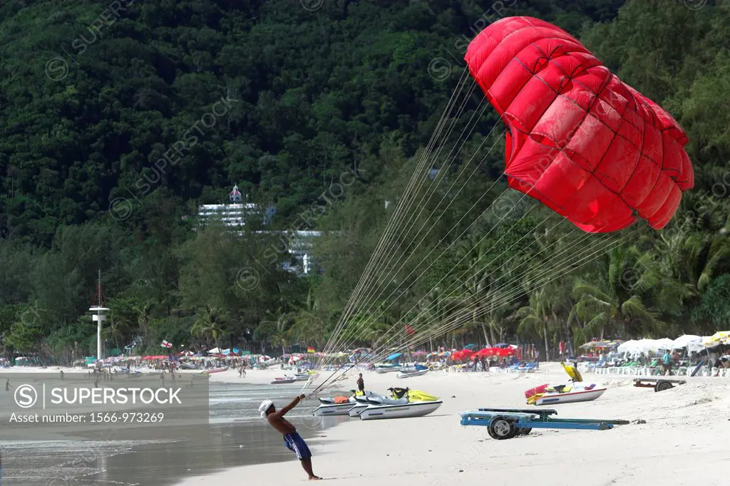 Filling parasail before flight Patong Beach after tsunami Phuket island Thailand