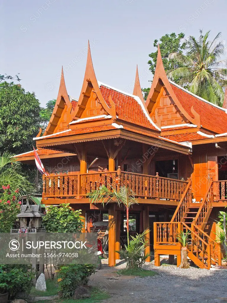 Traditional carved wood two storey Thai house with verandah Thai House Inn Lamai Beach Ko Samui island Thailand