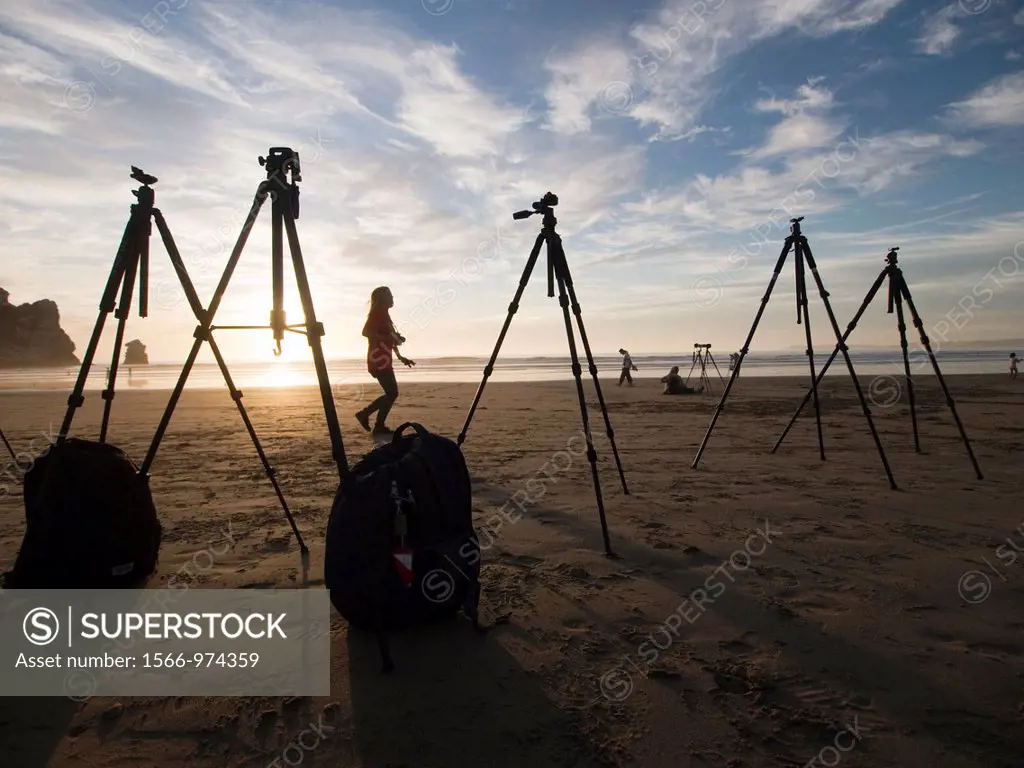 Photography equipment on the beach at sunset in Morro Bay, California, United States