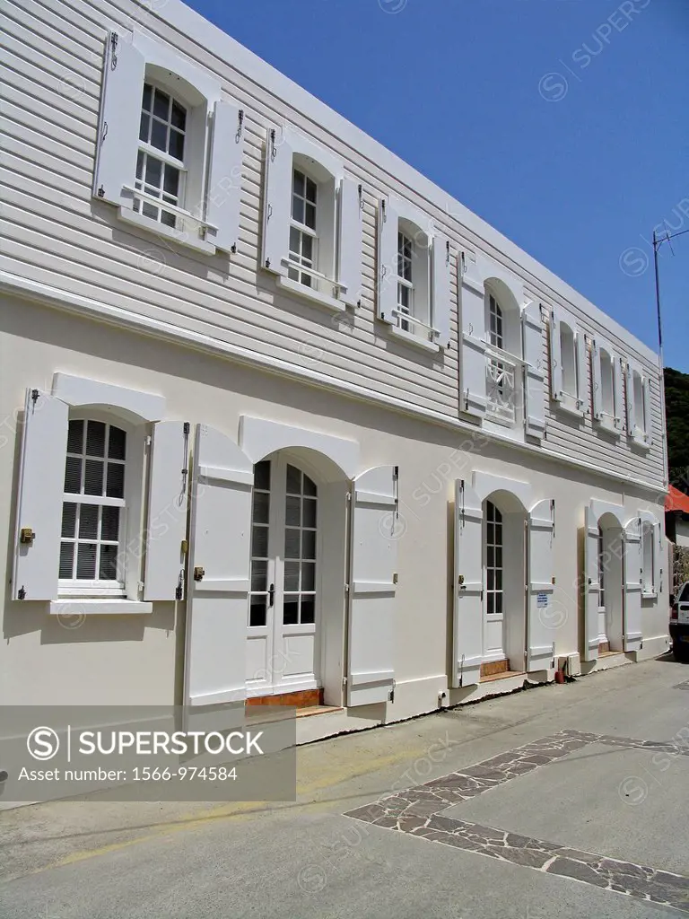 Renovated building with traditional door and window shutters Gustavia St Barts