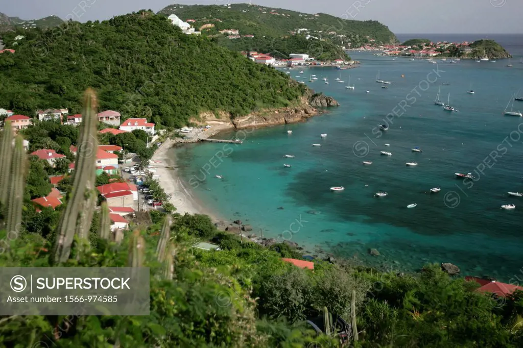 Village and beach Corossol St Barts with port of Gustavia in background