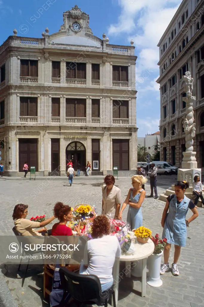 Cuba, Havana, Plaza de San Francisco, flower vendors