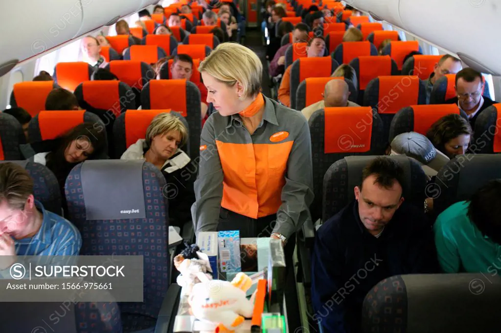 Stewardess serving passengers editorial use only, no negative publicity