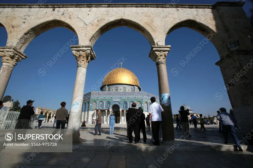 The Dome of the Rock on Temple Mount in the Old City of Jerusalem as seen from ancient arches