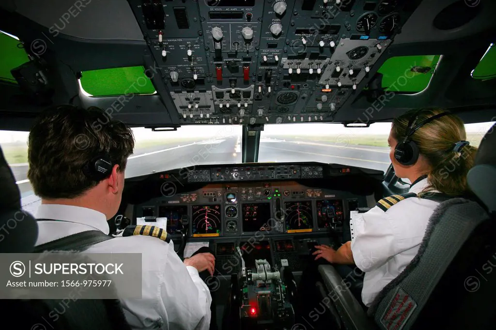 Pilot and co pilot working in a Boeing 737 editorial use only, no negative publicity