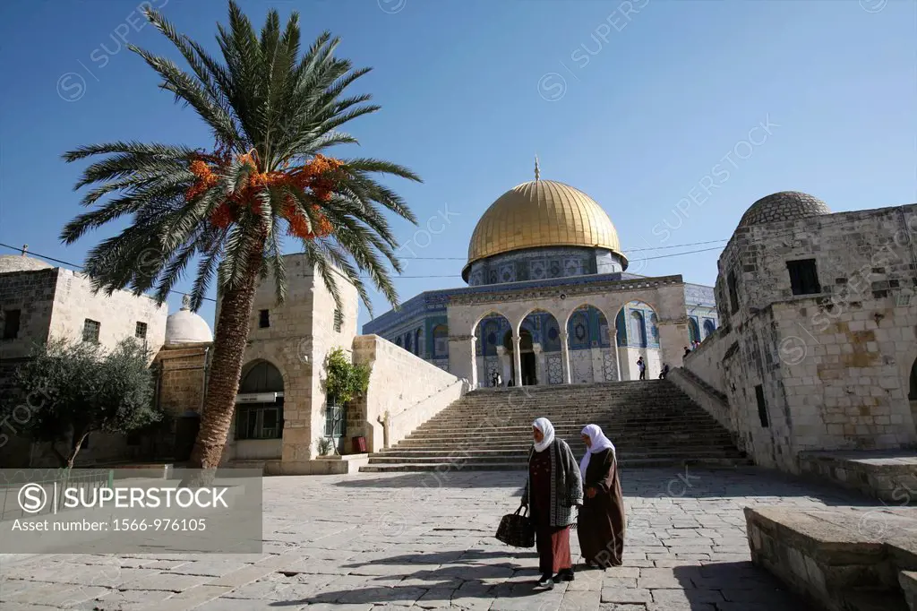 Women walking near the Dome of the Rock on Temple Mount in the Old City of Jerusalem Stairs lead up to the Temple Mount