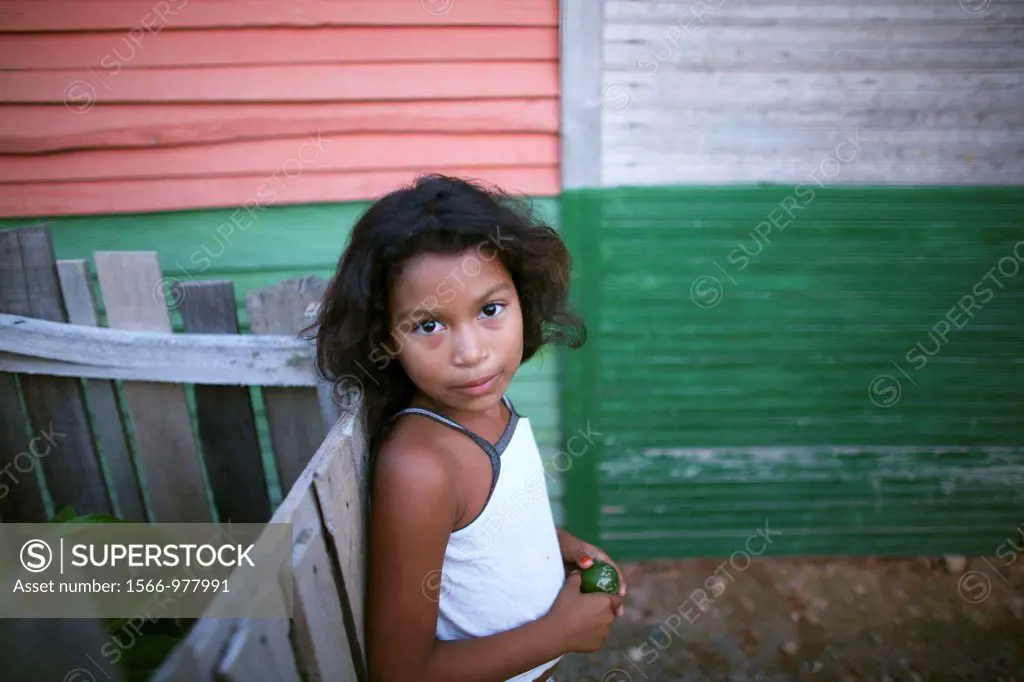 Portrait of a displaced girl in the slums of Colombia