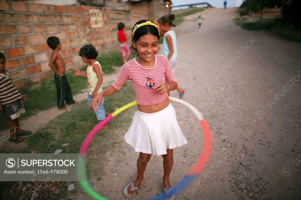 Children playing near a slum in Barrancabermeja