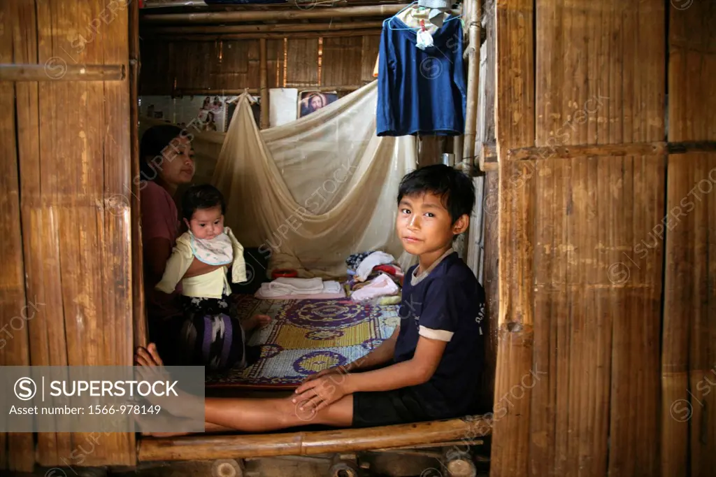 A refugee family living in Mae Sot Around 130,000 Burmese refugees have settled in Thailand due to opression in their homeland of Myanmar Burma Approx...