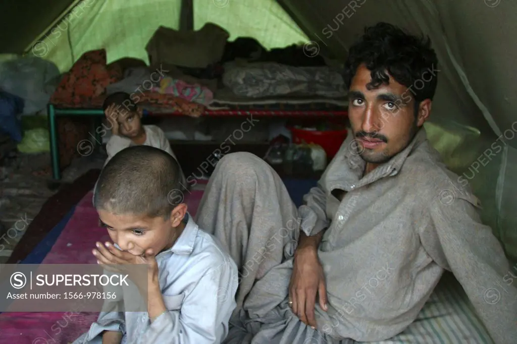 Displaced camp in Muzafarabad where people from destroyed village receive shelter and help from aid organizations On 8 october 2005, a severe earthqua...