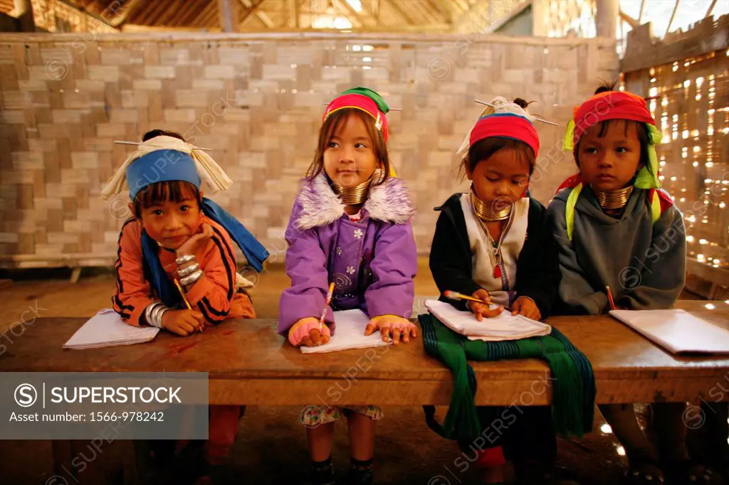 A group of young Longneck girls at school Approximately 300 Burmese refugees in Thailand are members of the indigenous group known as the Longnecks Th...