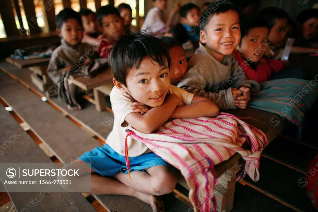 Boys at the village school in La Per Her village in Myanmar In Myanmar Burma, thousands of people have settled near the border as a result of oppressi...