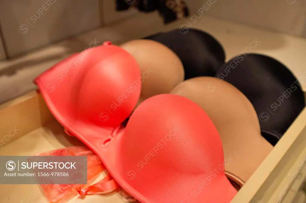 Push up bras in different colors on a store display