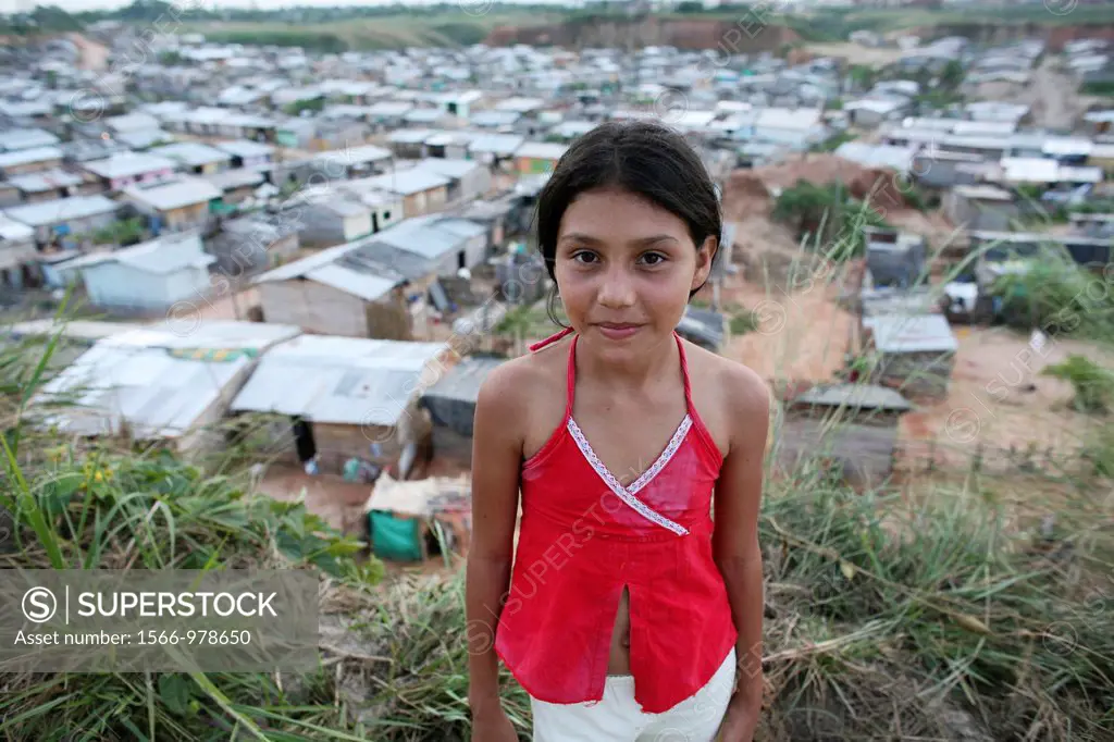 Portrait of a displaced girl in the slums of Colombia