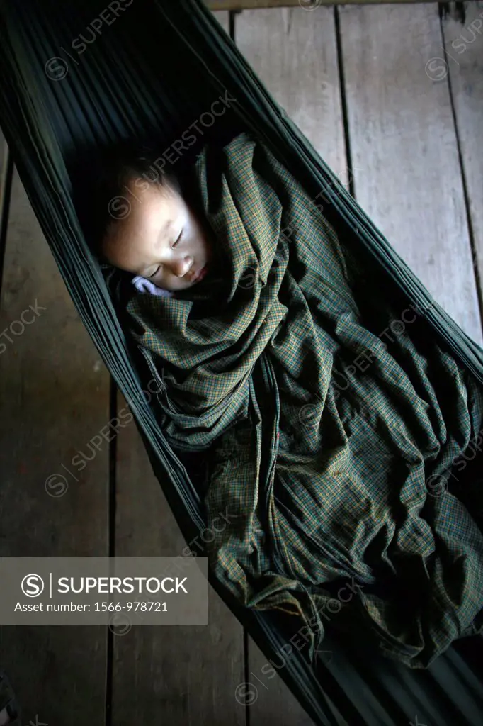 Longneck baby sleeping in a hammock Approximately 300 Burmese refugees in Thailand are members of the indigenous group known as the Longnecks The larg...