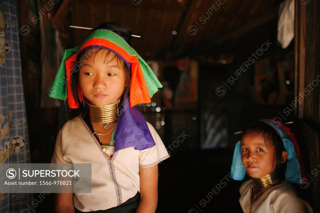 Two young Longneck girls indoors Approximately 300 Burmese refugees in Thailand are members of the indigenous group known as the Longnecks The largest...