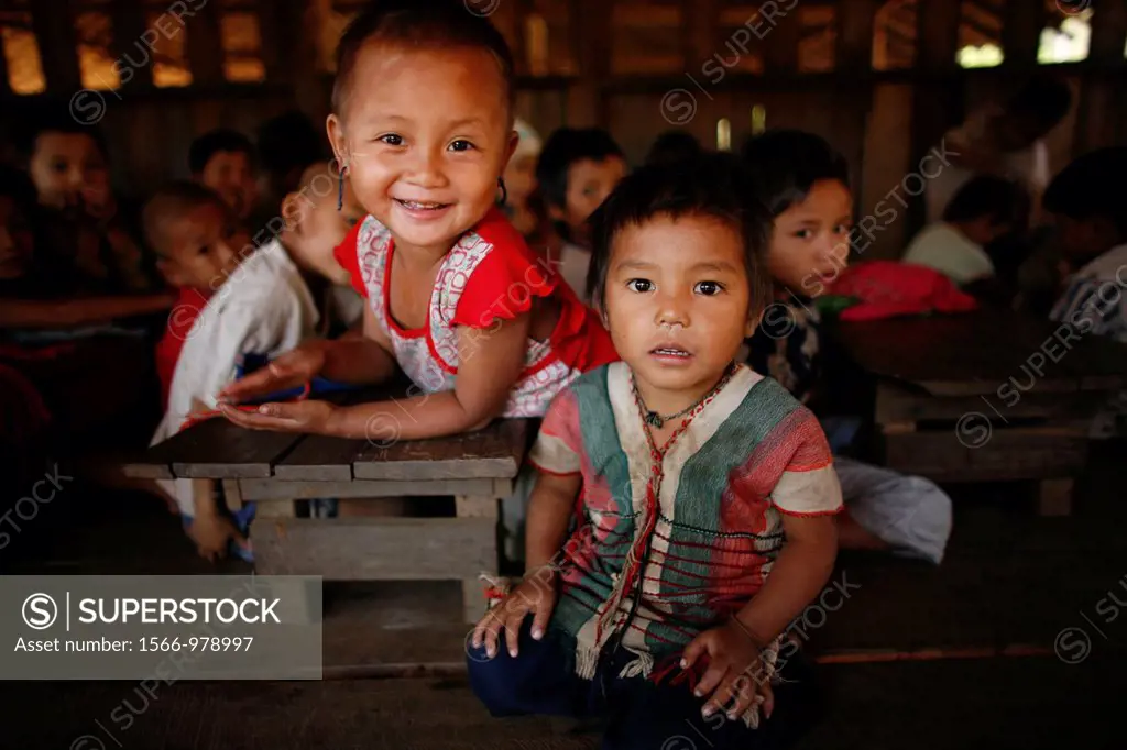 Children at the La Per Her village school in Myanmar In Myanmar Burma, thousands of people have settled near the border as a result of oppression in t...