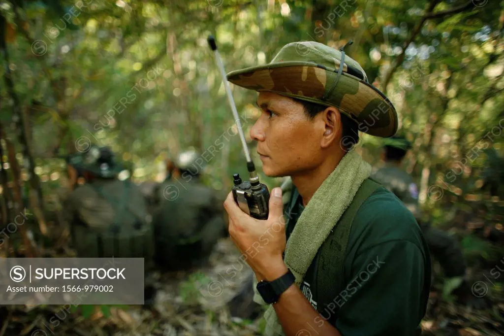 A KNLA soldier listens to his radio In Myanmar Burma, thousands of people have settled near the border as a result of oppression in their homeland Aro...