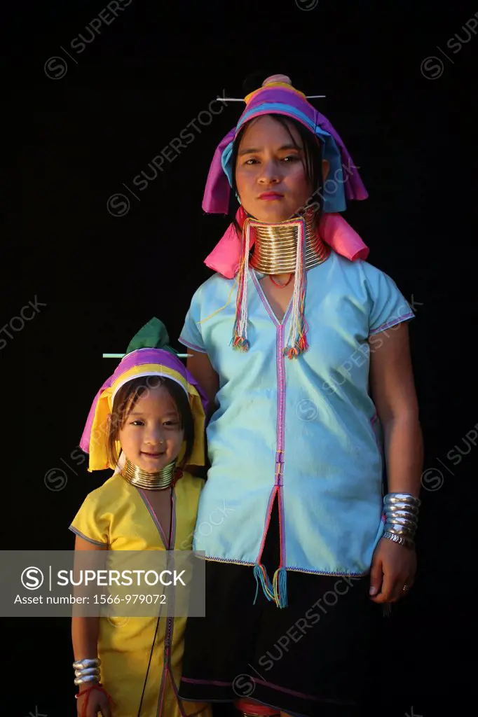 Longneck woman with young girl Approximately 300 Burmese refugees in Thailand are members of the indigenous group known as the Longnecks The largest o...