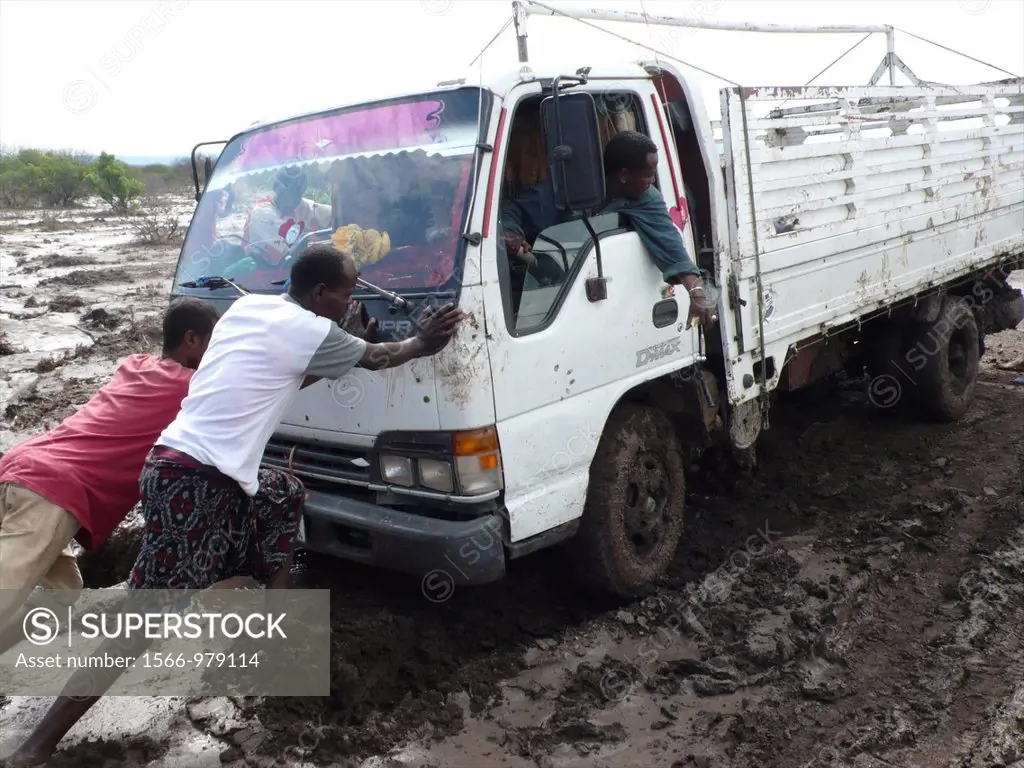 The roads are bad in Ethiopia and all the cars get stuck in the mud