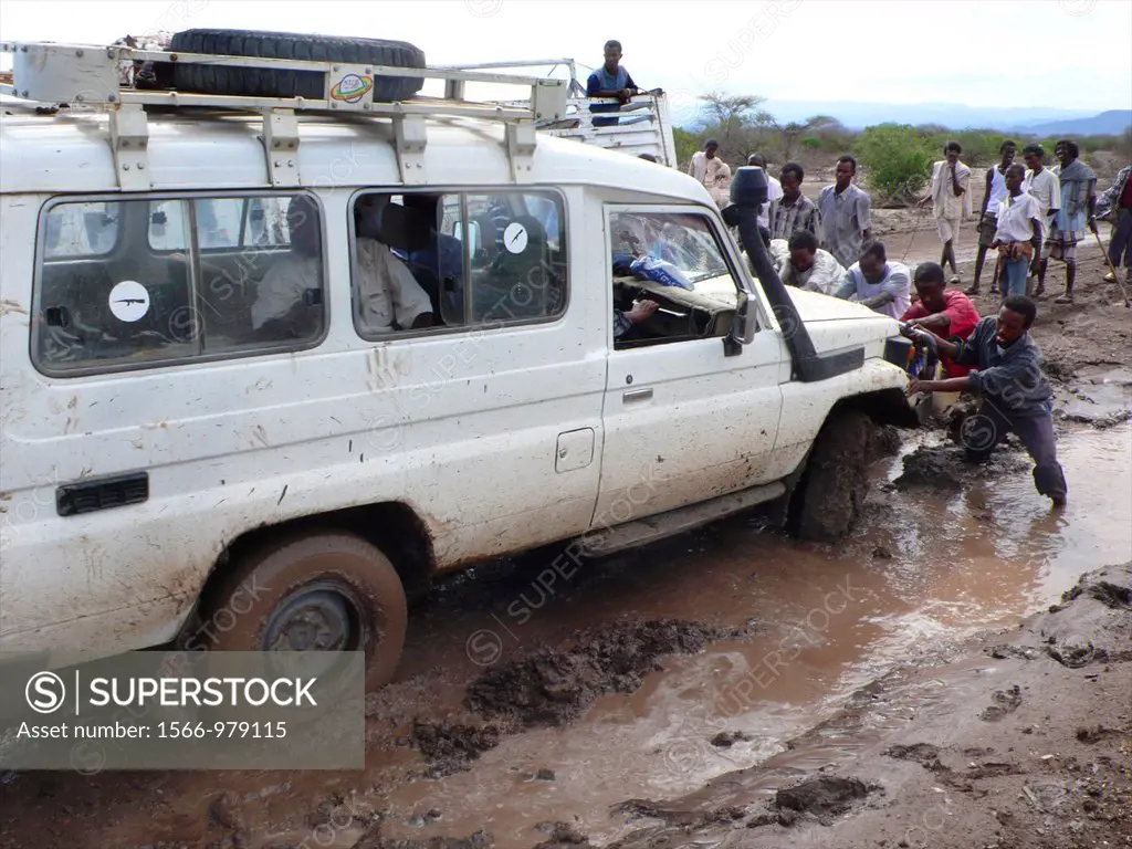The roads are bad in Ethiopia and all the cars get stuck in the mud