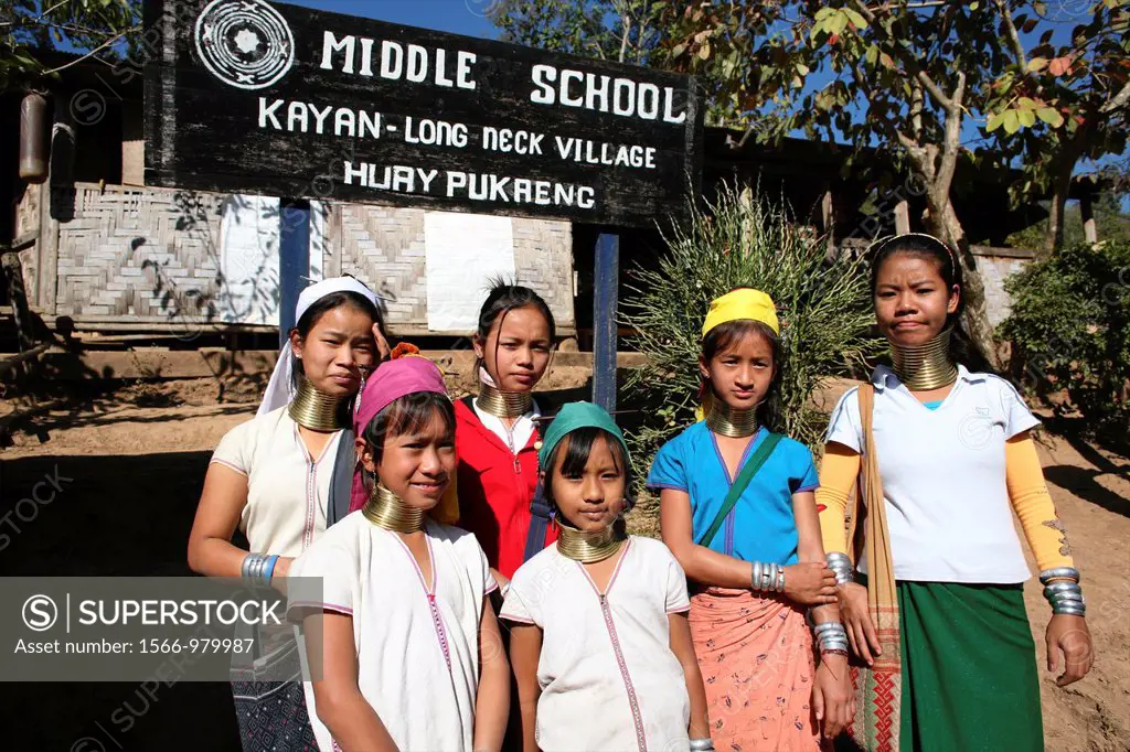 A group of Longneck school girls near a sign for their school Approximately 300 Burmese refugees in Thailand are members of the indigenous group known...