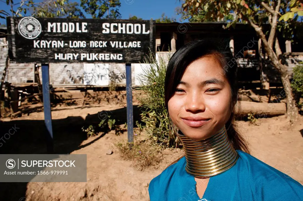 A Longneck girl poses outside of the village school Approximately 300 Burmese refugees in Thailand are members of the indigenous group known as the Lo...
