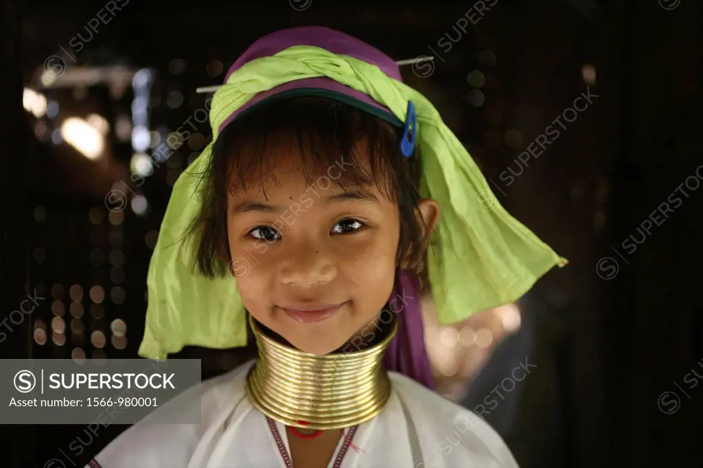 Portrait of a young Longneck girl Approximately 300 Burmese refugees in Thailand are members of the indigenous group known as the Longnecks The larges...