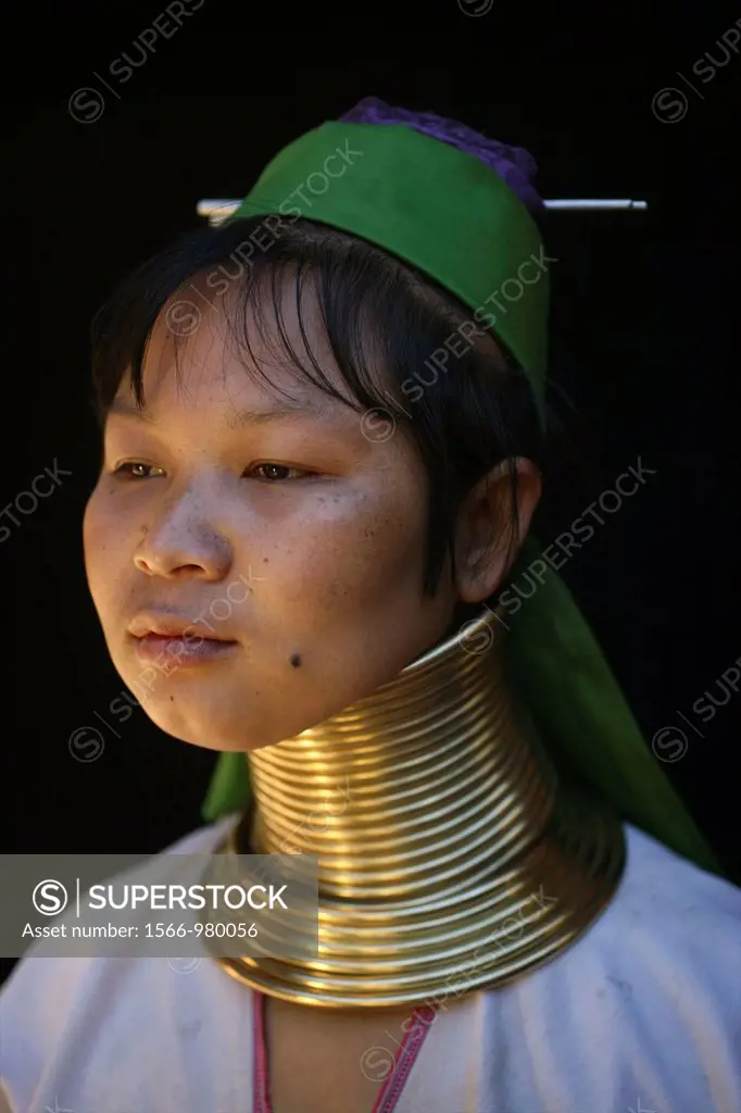 Portrait of a Longneck girl Approximately 300 Burmese refugees in Thailand are members of the indigenous group known as the Longnecks The largest of t...