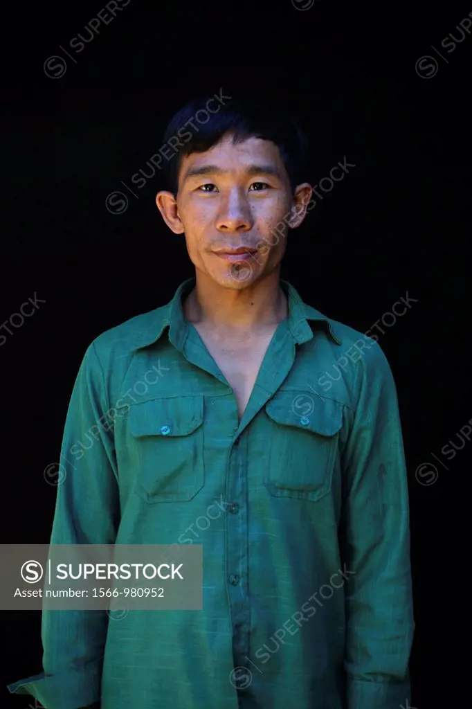 Portrait of a Longneck man Approximately 300 Burmese refugees in Thailand are members of the indigenous group known as the Longnecks The largest of th...