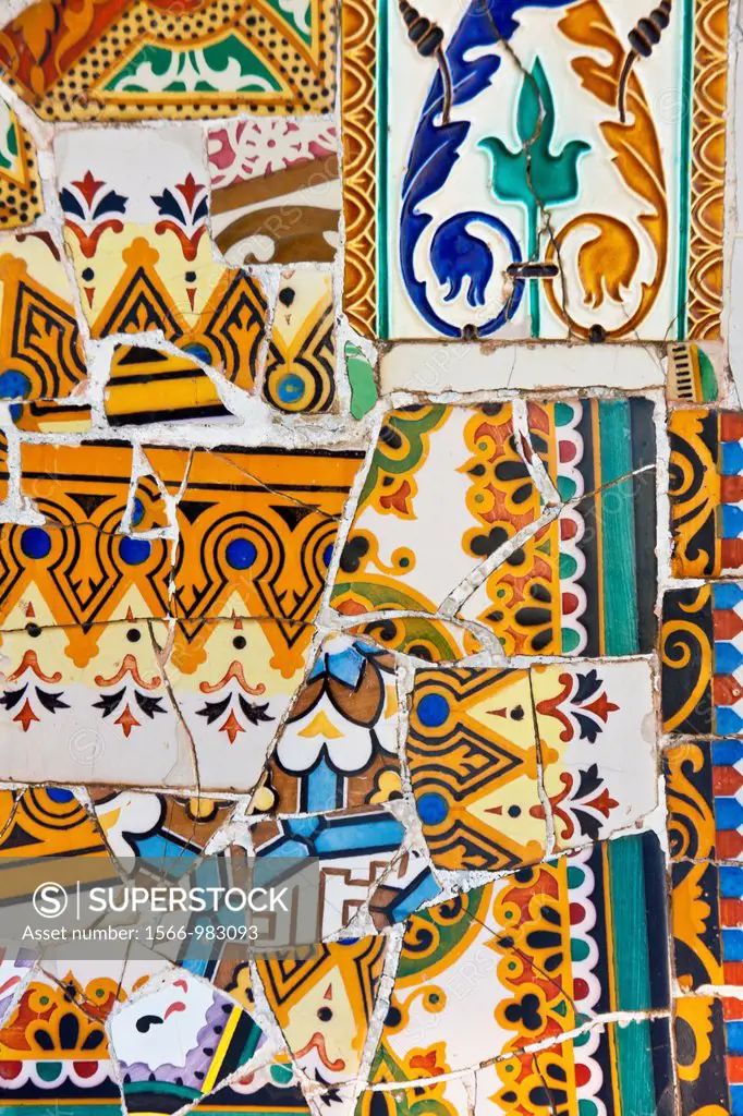 Details of the trencadis, broken mosaics, that cover an undulating bench in Park Güell, designed by the Catalan architect Antoni Gaudí and built in th...