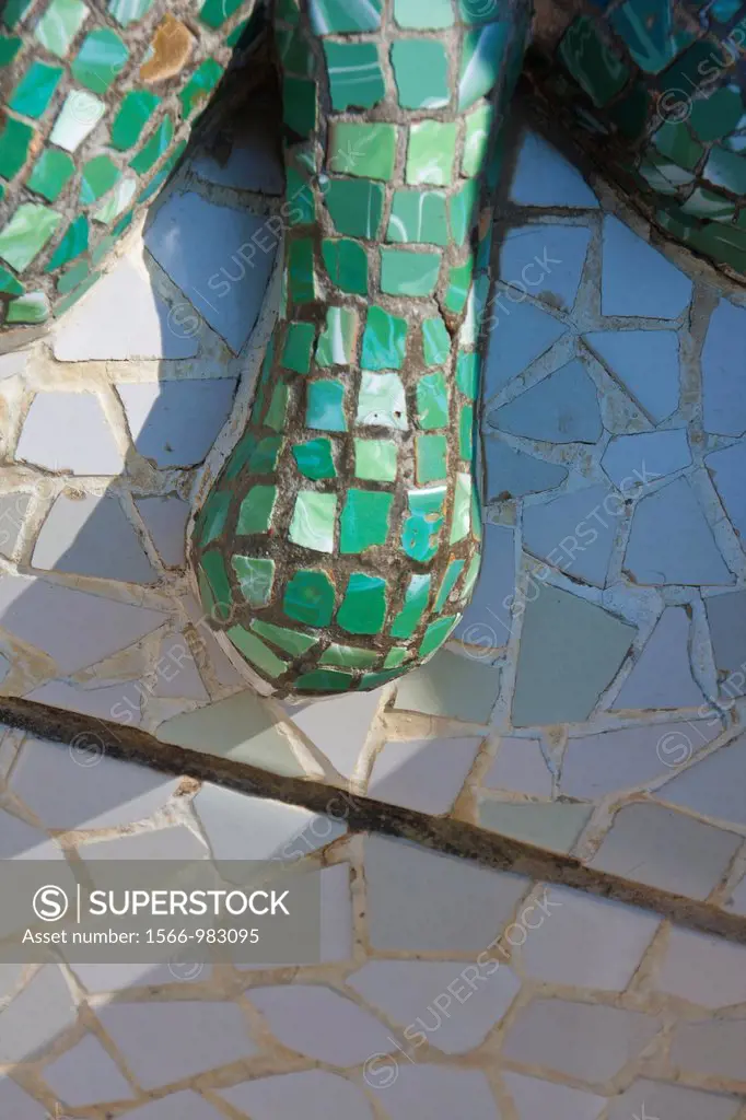 Details of the trencadis, broken mosaics, that cover Drag, dragon, salamandra, in Park Güell, designed by the Catalan architect Antoni Gaudí and built...