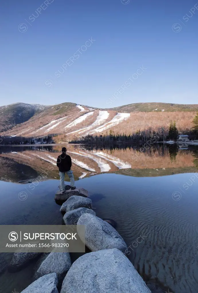 Franconia Notch State Park - Relection of Cannon Mountain in Echo Lake during the spring months in the White Mountains, New Hampshire USA