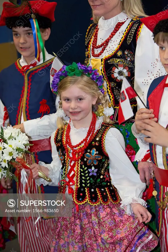 Detroit, Michigan - Meredith Bayus, 5, and members of the Zamek Dance Troupe prepare to welcome former Polish President Lech Walesa to Detroit