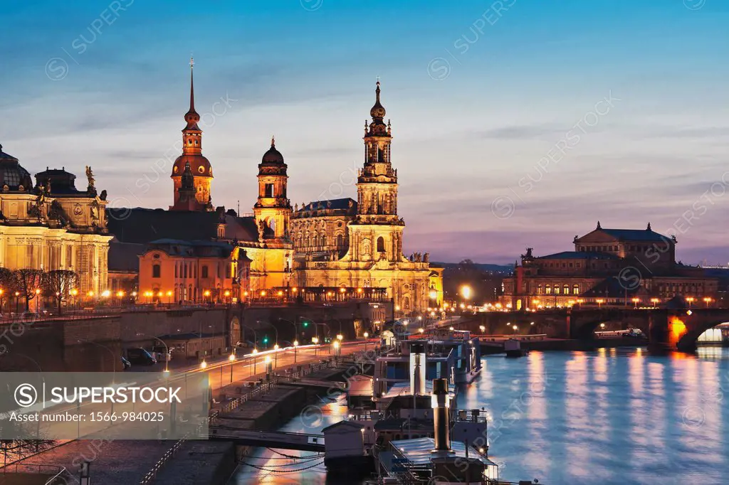 View over Elbe river to Bruehls Terrace, the academy of arts, house of the estates, Hausmannsturm tower, the Catholic Church of the Royal Court of Sax...