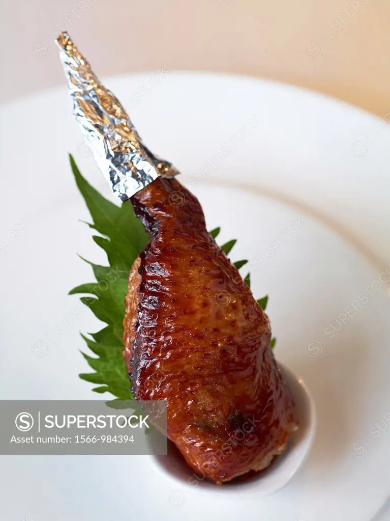 A Roasted Chicken wing stuffed with glutinous rice