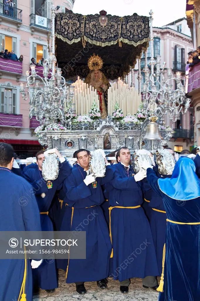 A Trono ´Float´ being carried through the streets, Semana Santa Holy Week Malaga, Andalusia, Spain