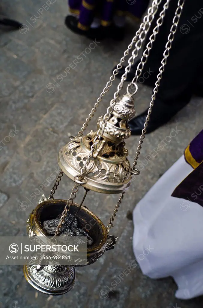 Detail of incense of La Lanzada brotherhood procession during Holy Week in Seville, Andalusia, Spain